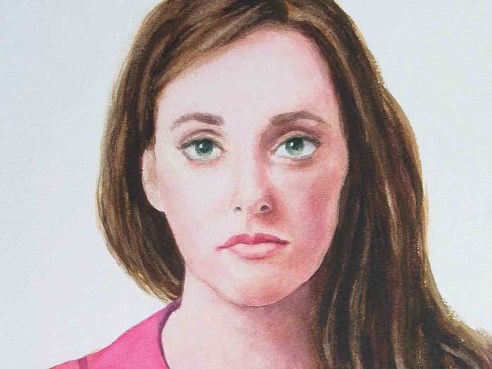 Watercolor painting of a woman's face. She has captivating eyes!